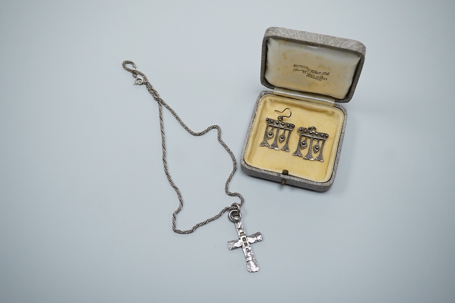 Michael Allen Bolton, a silver cross pendant and a pair of earrings, comprising: a cross pendant of textured design, length 5.1cm, British hallmarks for silver, sponsor's mark MAB, date letter for 1977, on a silver chain